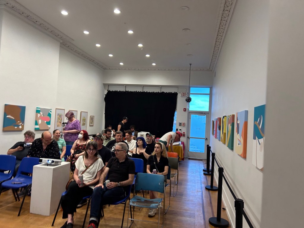 A picture of the space with people in it! I believe this was early on, with the seats not filled all the way yet, but there are at least twelve people in the picture, which is GREAT for a night that both Weird Al and Ghost were in town. Everyone looks cool. Awesome cool. It was pretty stuffy in there, but I'm heat intolerant.