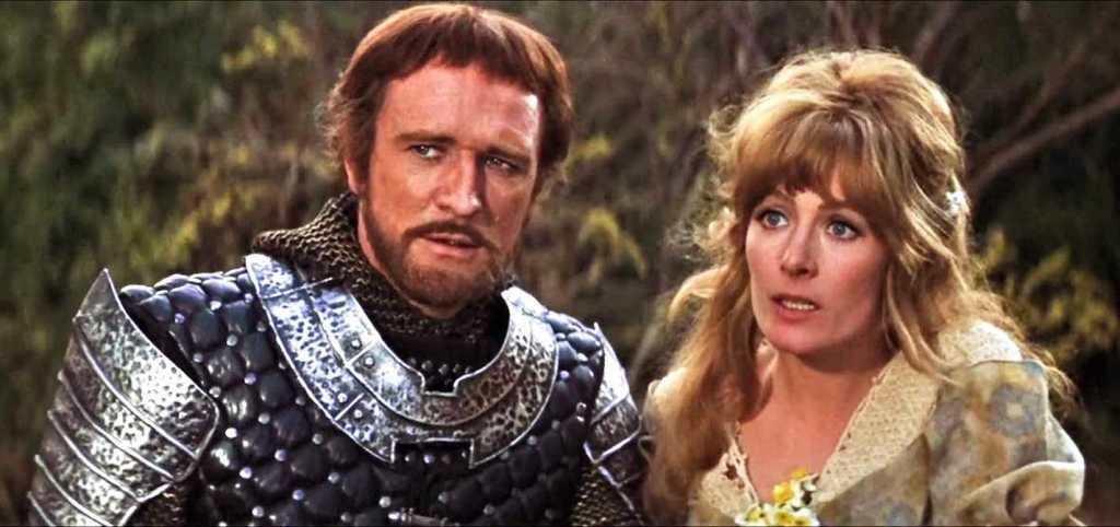 Arthur and Guenevere and her wig, not doing much of anything.