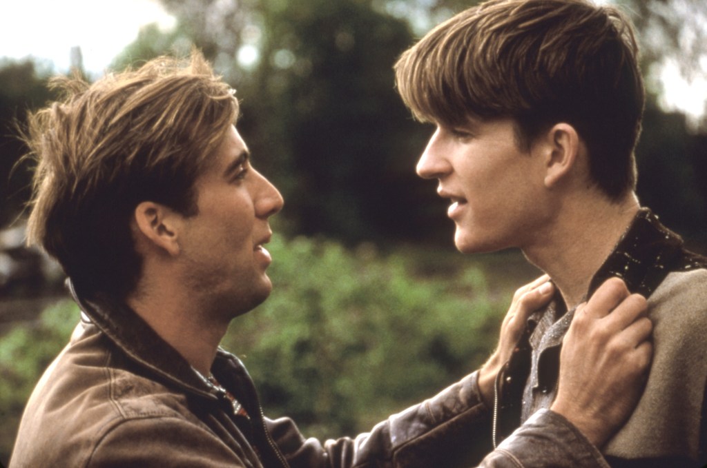 Nicolas Cage grabs Matthew Modine by the lapels.