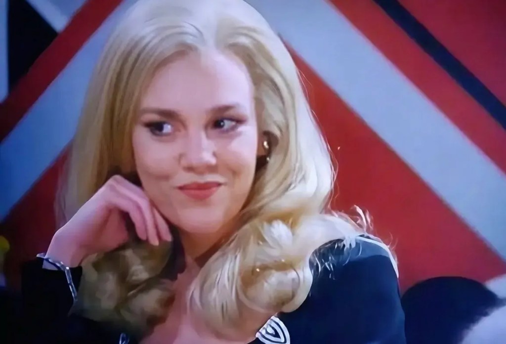 A very blonde Madeline Kahn smirks.